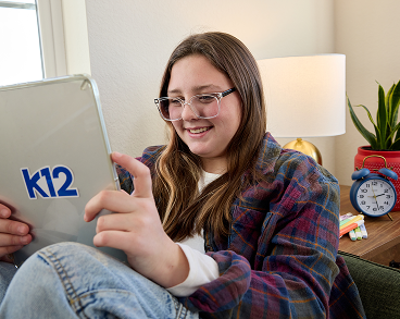 Student reading from her tablet