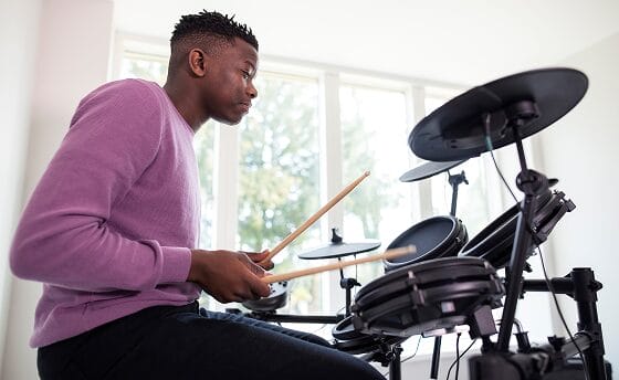 Student with a drum set