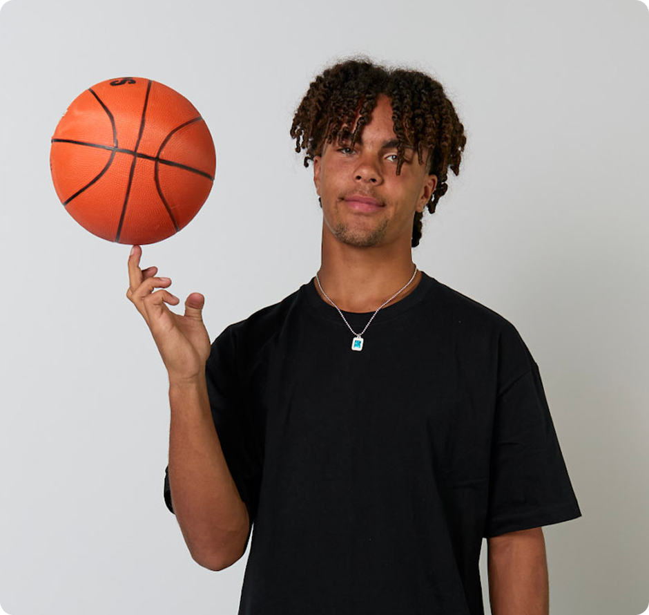 Student with a basket ball